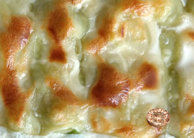 Gratin de ravioles du Dauphiné aux poireaux et muscade